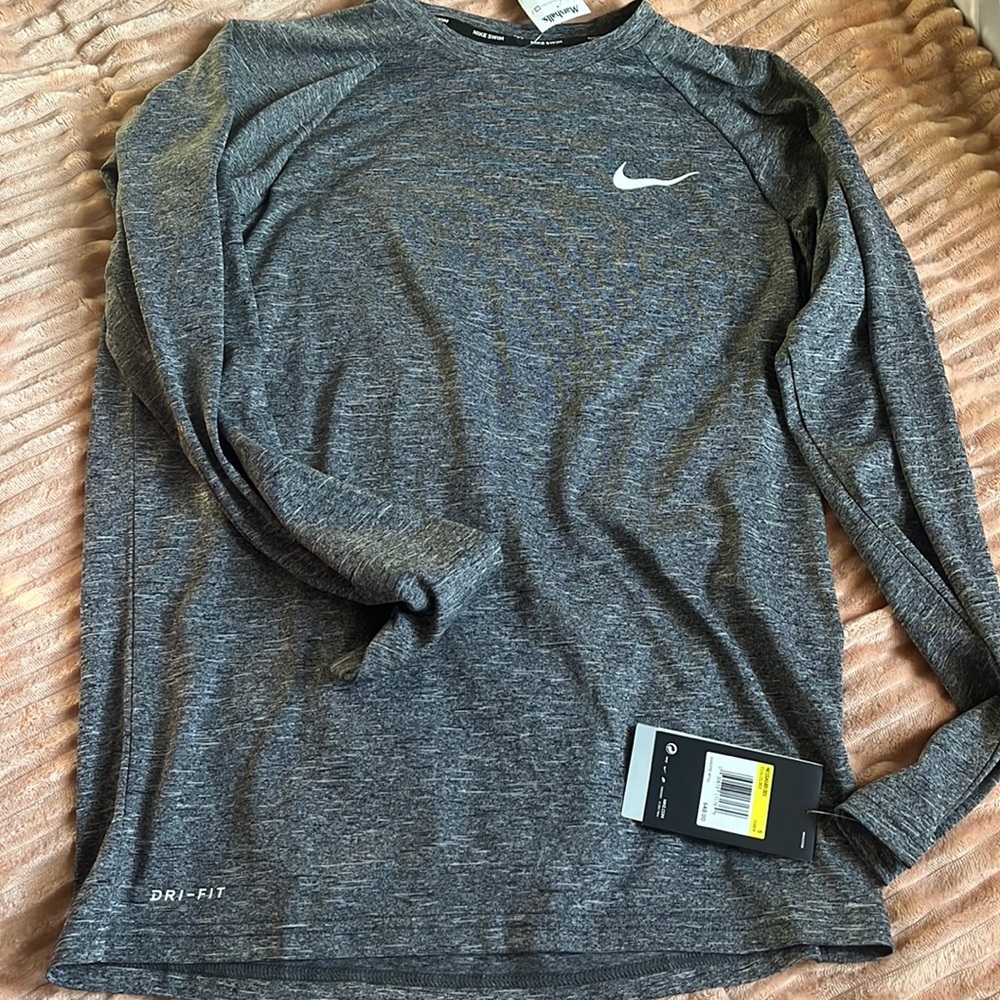 This is a small Nike Dri-fit active long sleeve shirt